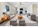 Spacious living room features a fireplace and large windows at 114 Blake Cv, Douglasville, GA 30134