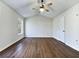 Main bedroom with wood flooring, window, and ceiling fan at 114 Blake Cv, Douglasville, GA 30134