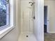 Clean shower stall with window and handheld shower head at 114 Blake Cv, Douglasville, GA 30134
