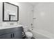 Clean bathroom featuring a tiled shower and vanity, designed with modern fixtures and a soothing color palette at 2937 Dansby Run, Acworth, GA 30101