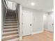 Finished basement with hardwood floors and neutral paint at 1697 Thomas St, Decatur, GA 30032