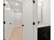 Basement bathroom with dark vanity and a modern mirror at 1697 Thomas St, Decatur, GA 30032