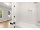Clean bathroom with bathtub and shower at 1697 Thomas St, Decatur, GA 30032