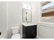 Modern bathroom with vanity, toilet, and shower at 1697 Thomas St, Decatur, GA 30032