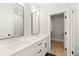 Modern bathroom with double vanity, large mirror, and walk-in shower at 1697 Thomas St, Decatur, GA 30032