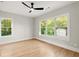 Well-lit bedroom with hardwood floors and a large window at 1697 Thomas St, Decatur, GA 30032