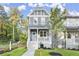 Charming craftsman style home with gray siding, white trim, and a welcoming front porch at 1697 Thomas St, Decatur, GA 30032