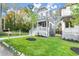 Gray craftsman home with white trim and a landscaped yard at 1697 Thomas St, Decatur, GA 30032