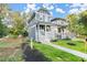 Two-story home with gray siding, white trim, and a front porch at 1697 Thomas St, Decatur, GA 30032