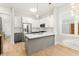 Modern kitchen with stainless steel appliances and white and gray cabinetry at 1697 Thomas St, Decatur, GA 30032