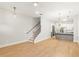 Spacious living room with hardwood floors and a staircase at 1697 Thomas St, Decatur, GA 30032
