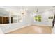 Living room with hardwood floors, staircase, and lots of natural light at 1697 Thomas St, Decatur, GA 30032