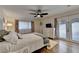 Spacious bedroom with king-size bed and access to patio at 3255 Embry Hills Dr, Atlanta, GA 30341