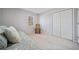 Bedroom with daybed, rocking chair, and double doors at 585 Tyson Knls, Roswell, GA 30076