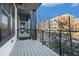 Private balcony with city views and modern metal railing at 64 Rogers Ne St, Atlanta, GA 30317