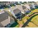 Aerial view showcasing a house with backyard and trampoline at 711 Bridgeview Dr, Holly Springs, GA 30115