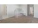 Bedroom with a house bed and carpet flooring at 711 Bridgeview Dr, Holly Springs, GA 30115
