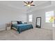 Large main bedroom with carpeted floor and ceiling fan at 711 Bridgeview Dr, Holly Springs, GA 30115