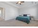 Main bedroom with carpeted floor and ceiling fan at 711 Bridgeview Dr, Holly Springs, GA 30115