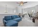 Home office with a sectional sofa and two work stations at 711 Bridgeview Dr, Holly Springs, GA 30115