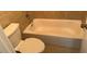 Clean bathroom featuring a bathtub and tile floor at 8374 Carlton Rd, Riverdale, GA 30296