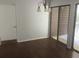 Dining room with hardwood floors and access to deck at 8374 Carlton Rd, Riverdale, GA 30296