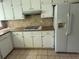 Kitchen with granite countertops and gas range at 8374 Carlton Rd, Riverdale, GA 30296