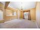 Separate dining area with neutral color palette and carpeting at 447 Two Iron Nw Trl, Kennesaw, GA 30144