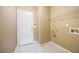 Functional laundry room with built-in shelving and hookups at 447 Two Iron Nw Trl, Kennesaw, GA 30144