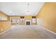 Open living room with a fireplace and plenty of natural light at 447 Two Iron Nw Trl, Kennesaw, GA 30144