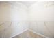 Spacious walk-in closet with wire shelving provides ample storage at 447 Two Iron Nw Trl, Kennesaw, GA 30144