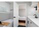 Bathroom featuring soaking tub with a view to a bedroom through an open door at 649 Ozburn Nw Rd, Atlanta, GA 30318