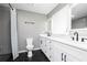 Bathroom features a double vanity, modern finishes, and an updated shower at 649 Ozburn Nw Rd, Atlanta, GA 30318