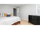 This bright bedroom boasts natural light, wood floors, and closet at 649 Ozburn Nw Rd, Atlanta, GA 30318