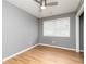 Empty room features wood floors and neutral tones at 649 Ozburn Nw Rd, Atlanta, GA 30318