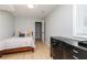 Bedroom with wood floors and a closet provides functional space at 649 Ozburn Nw Rd, Atlanta, GA 30318