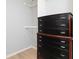 Closet featuring custom built in black wood dresser for storage at 649 Ozburn Nw Rd, Atlanta, GA 30318