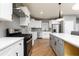 Well-appointed kitchen boasts modern appliances, ample counter space, and stylish cabinetry at 649 Ozburn Nw Rd, Atlanta, GA 30318