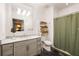 Clean bathroom, featuring a marble vanity and shower at 10625 Serenbe Ln # 103, Chattahoochee Hills, GA 30268