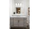 Bathroom with a modern vanity and large mirror at 10625 Serenbe Ln # 103, Chattahoochee Hills, GA 30268