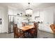 Modern kitchen with white cabinets and stainless steel appliances at 10625 Serenbe Ln # 103, Chattahoochee Hills, GA 30268