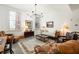 Relaxing living room with a daybed and armchairs at 10625 Serenbe Ln # 103, Chattahoochee Hills, GA 30268