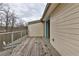 Wooden deck with metal railing and a view of the surrounding landscape and blue sky at 1412 Peter Haughton Nw Way, Atlanta, GA 30318