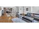 An expansive living space showcases modern interiors and seamless transitions between living areas at 1412 Peter Haughton Nw Way, Atlanta, GA 30318