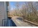 A winding street view through the trees near the building at 1412 Peter Haughton Nw Way, Atlanta, GA 30318
