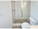 Modern bathroom featuring a glass-enclosed shower and white subway tiles, providing a clean and sleek design at 518 Healy Dr # 68, Cumming, GA 30040