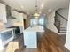 Contemporary kitchen with stainless steel appliances, subway tile backsplash, and a spacious island at 518 Healy Dr # 68, Cumming, GA 30040