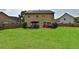 Large backyard with patio and plenty of green space at 3945 Silverthorn Trce, Cumming, GA 30028