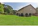 Large backyard with patio and plenty of green space at 3945 Silverthorn Trce, Cumming, GA 30028