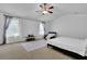 Spacious primary bedroom with high ceilings and ample natural light at 3945 Silverthorn Trce, Cumming, GA 30028